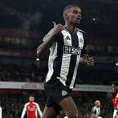 Newcastle United's Swedish striker #14 Alexander Isak celebrates scoring the opening goal during the English League Cup semi-final first leg football match between Arsenal and Newcastle United at the Emirates Stadium, in London on January 7, 2025. (Photo by Glyn KIRK / AFP) / RESTRICTED TO EDITORIAL USE. No use with unauthorized audio, video, data, fixture lists, club/league logos or 'live' services. Online in-match use limited to 120 images. An additional 40 images may be used in extra time. No video emulation. Social media in-match use limited to 120 images. An additional 40 images may be used in extra time. No use in betting publications, games or single club/league/player publications. /  (Photo by GLYN KIRK/AFP via Getty Images)