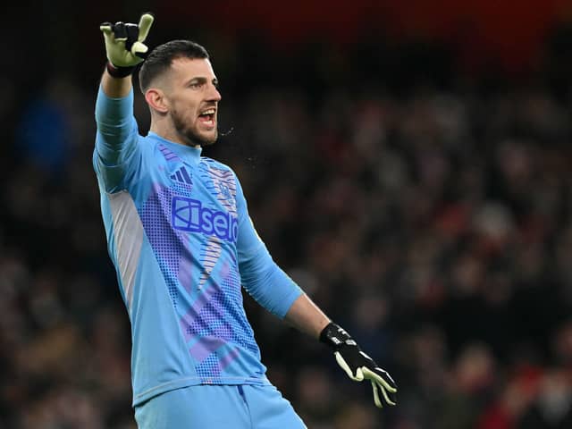 Newcastle United's Slovakian goalkeeper Martin Dubravka shouts instructions to the players during the English League Cup semi-final first leg football match between Arsenal and Newcastle United at the Emirates Stadium, in London on January 7, 2025. (Photo by Glyn KIRK / AFP) 