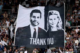 Fans of Newcastle United show their thanks to co-owners Mehrdad Ghodoussi and Amanda Staveley with a flag prior to the Premier League match between Newcastle United FC and Southampton FC at St James' Park on August 17, 2024 in Newcastle upon Tyne, England.