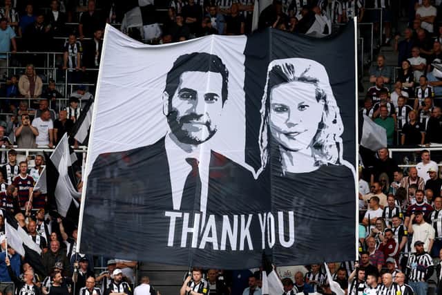 Fans of Newcastle United show their thanks to co-owners Mehrdad Ghodoussi and Amanda Staveley with a flag prior to the Premier League match between Newcastle United FC and Southampton FC at St James' Park on August 17, 2024 in Newcastle upon Tyne, England.