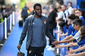 Dango Ouattara of AFC Bournemouth arrives at the stadium prior to the Premier League match between Chelsea FC and AFC Bournemouth at Stamford Bridge.