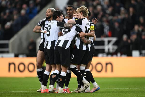 Newcastle players congratulate Alexander Isak (c) after he had scored the second goal during the Premier League match between Newcastle United FC and Wolverhampton Wanderers FC at St James' Park on January 15, 2025 in Newcastle upon Tyne, England. (Photo by Stu Forster/Getty Images)