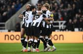 Newcastle players congratulate Alexander Isak (c) after he had scored the second goal during the Premier League match between Newcastle United FC and Wolverhampton Wanderers FC at St James' Park on January 15, 2025 in Newcastle upon Tyne, England. (Photo by Stu Forster/Getty Images)