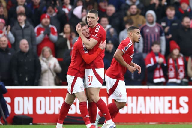 Elliot Anderson of Nottingham Forest celebrates scoring his team's first goal with teammate Nikola Milenkovic during the win over Southampton. (Photo by Dan Istitene/Getty Images)