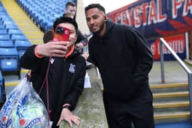 Lloyd Kelly of Newcastle United poses for a photo with fans prior to the Premier League match between Crystal Palace FC and Newcastle United FC at Selhurst Park on November 30, 2024 in London, England. (Photo by Eddie Keogh/Getty Images)