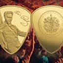 The gold plectrum coin is layered in pure 24-carat gold