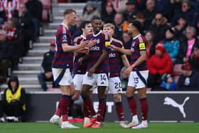 Alexander Isak of Newcastle United celebrates scoring his team's second goal with teammates during the Premier League match between Southampton FC and Newcastle United FC. (Photo by Ryan Pierse/Getty Images)