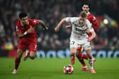 Lille's Icelandic midfielder #07 Hakon Arnar Haraldsson (R) fights for the ball with Liverpool's Colombian midfielder #07 Luis Diaz during the UEFA Champions League. (Photo by PAUL ELLIS/AFP via Getty Images)