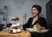 Photo of business owner with vegan cupcakes