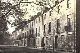 Lovaine Place in 1957 where some of the houses were empty, boarded up and awaiting demolition.