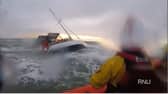 RNLI preparing to rescue passengers on a yacht