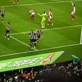 Alexander Isak of Newcastle United celebrates scoring a goal that is later disallowed for offside, with teammates, during the Carabao Cup Semi Final Second Leg match between Newcastle United and Arsenal at St James' Park on February 05, 2025 in Newcastle upon Tyne, England. (Photo by Michael Regan/Getty Images)
