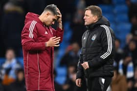 Bruno Guimaraes of Newcastle reacts as head coach Eddie Howe looks on after the Premier League match between Manchester City FC and Newcastle United FC at Etihad Stadium on February 15, 2025 in Manchester, England. (Photo by Stu Forster/Getty Images)