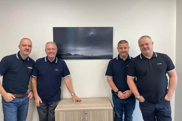 The Wilson family. From left to right, Jonathan, Harry, Gary and Chris.