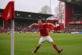 Nottingham Forest's New Zealand striker #11 Chris Wood celebrates after scoring their third goal during the English Premier League football match between Nottingham Forest and Brighton and Hove Albion at The City Ground in Nottingham, central England, on February 1, 2025. (Photo by Oli SCARFF / AFP)      
