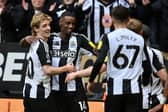 Newcastle United's Swedish striker #14 Alexander Isak (2L) celebrates with teammates after scoring their fourth goal during the English Premier League football match between Newcastle United and Nottingham Forest at St James' Park in Newcastle-upon-Tyne, north east England on February 23, 2025. (Photo by ANDY BUCHANAN / AFP)     