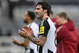 Newcastle United's Italian midfielder #08 Sandro Tonali applauds fans after the English Premier League football match between Newcastle United and Nottingham Forest at St James' Park in Newcastle-upon-Tyne, north east England on February 23, 2025. Newcastle won the game 4-3. (Photo by ANDY BUCHANAN / AFP)