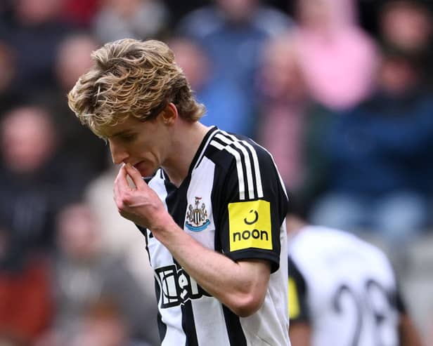 Anthony Gordon of Newcastle United leaves the pitch after being shown a red card during the Emirates FA Cup Fifth Round match between Newcastle United and Brighton & Hove Albion at St James' Park on March 02, 2025 in Newcastle upon Tyne, England. (Photo by Stu Forster/Getty Images)