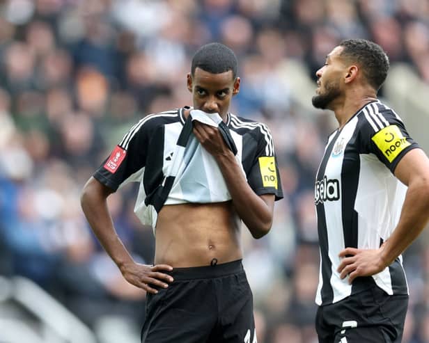 Alexander Isak (L) and Joelinton of Newcastle United react during the Emirates FA Cup Fifth Round match between Newcastle United and Brighton & Hove Albion at St James' Park on March 02, 2025 in Newcastle upon Tyne, England. (Photo by George Wood/Getty Images)