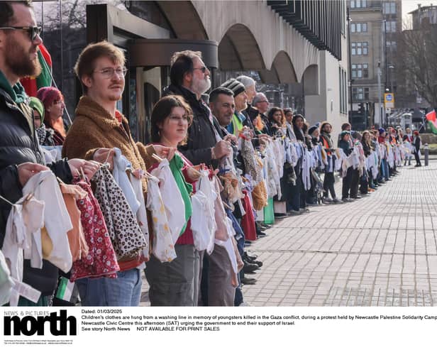 Children's clothes are hung from a washing line in memory of youngsters killed in the Gaza conflict, during a protest held by Newcastle Palestine Solidarity Campaign at Newcastle Civic Centre on Saturday, March 1 urging the government to end their support of Israel