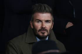 David Beckham looks on ahead of the UEFA Champions League Round of 16 first leg football match between Paris Saint-Germain (FRA) and Liverpool (ENG) at the Parc des Princes stadium in Paris on March 5, 2025. (Photo by Anne-Christine POUJOULAT / AFP) (Photo by ANNE-CHRISTINE POUJOULAT/AFP via Getty Images)          