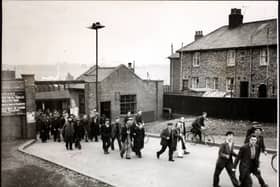 The big walk-out as the nationwide shipyard strike begins. 
(Photo by Fox Photos/Hulton Archive/Getty Images)