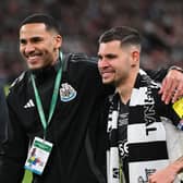 Jamaal Lascelles and Bruno Guimaraes of Newcastle United pose for a photo after the Carabao Cup Final between Liverpool and Newcastle United at Wembley Stadium on March 16, 2025 in London, England. (Photo by Stu Forster/Getty Images)