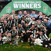 The Newcastle United squad and members of the coaching staff celebrate in a team picture after  the Carabao Cup Final between Liverpool and Newcastle United at Wembley Stadium on March 16, 2025 in London, England. (Photo by Stu Forster/Getty Images)