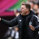 Eddie Howe shouts and gesticulates from the touchline at Wembley