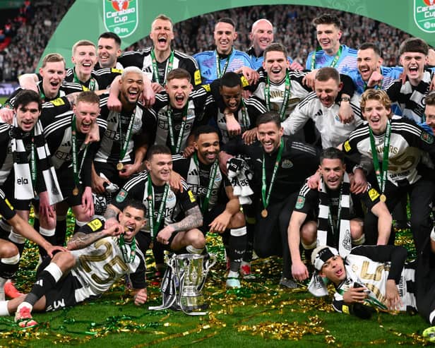The Newcastle United squad and members of the coaching staff celebrate in a team picture after the Carabao Cup Final between Liverpool and Newcastle United at Wembley Stadium on March 16, 2025 in London, England. (Photo by Stu Forster/Getty Images)