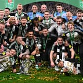The Newcastle United squad and members of the coaching staff celebrate in a team picture after the Carabao Cup Final between Liverpool and Newcastle United at Wembley Stadium on March 16, 2025 in London, England. (Photo by Stu Forster/Getty Images)