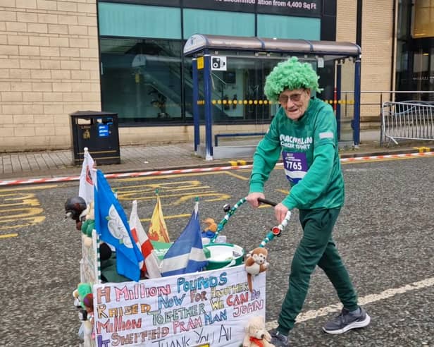 John Burkhill was taking part with his pram and green wig. Photo: David Kessen, National World