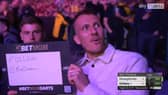 Harvey Barnes (left) and Dan Burn at the Premier League Darts last night
