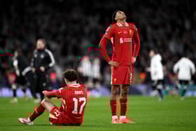 Jarell Quansah and Curtis Jones of Liverpool look dejected after the team's defeat in the Carabao Cup Final between Liverpool and Newcastle United at Wembley Stadium on March 16, 2025 in London, England. (Photo by Justin Setterfield/Getty Images)