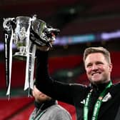 Eddie Howe, Manager of Newcastle United, lifts the Carabao Cup Trophy after his team's victory during the Carabao Cup Final between Liverpool and Newcastle United at Wembley Stadium on March 16, 2025 in London, England. (Photo by Stu Forster/Getty Images)