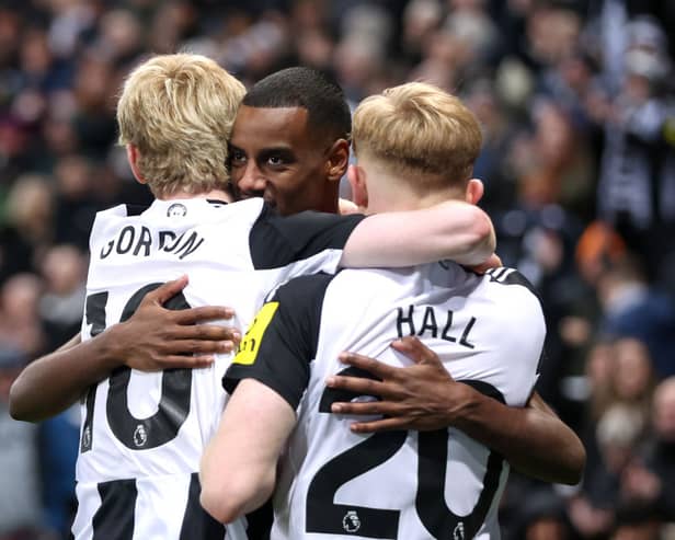 Alexander Isak of Newcastle United celebrates scoring his team's third goal with teammates during the Premier League match between Newcastle United FC and Leicester City FC at St James' Park on December 14, 2024 in Newcastle upon Tyne, England. (Photo by George Wood/Getty Images)