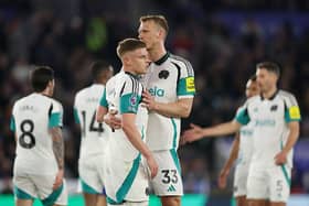 Harvey Barnes of Newcastle United celebrates scoring his team's third goal with teammate Dan Burn during the Premier League match between Leicester City FC and Newcastle United FC at The King Power Stadium on April 07, 2025 in Leicester, England. (Photo by Alex Pantling/Getty Images)