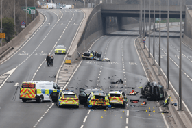 Two people have been arrested after seven police officers required hospital treatment following a collision on the A1.