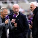 Steve Bower, TV presenter, and former Newcastle United players Alan Sheerer and David Ginola present the pre-match coverage for Premier League TV prior to the Premier League match between Newcastle United FC and Manchester United FC at St James' Park on April 13, 2025 in Newcastle upon Tyne, England. (Photo by Stu Forster/Getty Images)