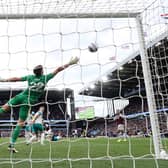 Nick Pope of Newcastle United dives and fails to save the shot of Amadou Onana of Aston Villa which results in their fourth goal during the Premier League match between Aston Villa FC and Newcastle United FC at Villa Park on April 19, 2025 in Birmingham, England. (Photo by Michael Steele/Getty Images)