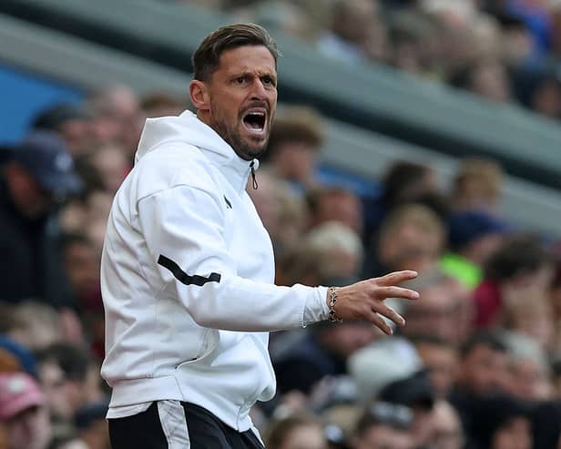 Newcastle United's assistant coach Jason Tindall gestures on the touchline during the English Premier League football match between Aston Villa and Newcastle United at Villa Park in Birmingham, central England on April 19, 2025. (Photo by Darren Staples / AFP) /
