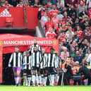 Freddie Woodman of Newcastle United leads his side out prior to the Premier League match between Manchester United and Newcastle United at Old Trafford on September 11, 2021 in Manchester, England. (Photo by Laurence Griffiths/Getty Images)