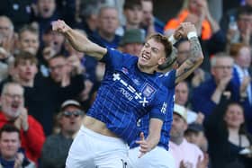 Liam Delap of Ipswich Town celebrates scoring his team's first goal during the Premier League match between Ipswich Town FC and Wolverhampton Wanderers FC at Portman Road on April 05, 2025 in Ipswich, England. (Photo by Richard Pelham/Getty Images)