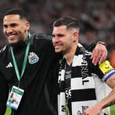 Jamaal Lascelles and Bruno Guimaraes of Newcastle United pose for a photo after the Carabao Cup Final between Liverpool and Newcastle United at Wembley Stadium on March 16, 2025 in London, England. (Photo by Stu Forster/Getty Images)