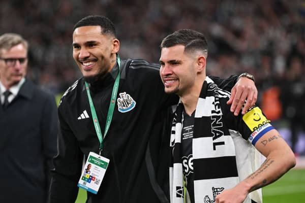 Jamaal Lascelles and Bruno Guimaraes of Newcastle United pose for a photo after the Carabao Cup Final between Liverpool and Newcastle United at Wembley Stadium on March 16, 2025 in London, England. (Photo by Stu Forster/Getty Images)