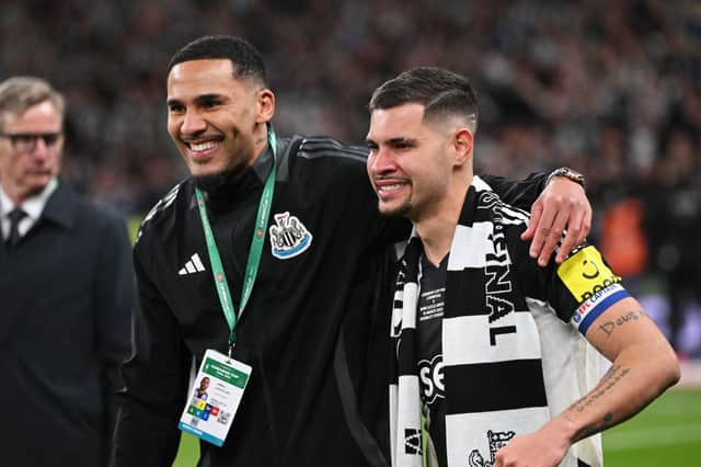 Jamaal Lascelles and Bruno Guimaraes of Newcastle United pose for a photo after the Carabao Cup Final between Liverpool and Newcastle United at Wembley Stadium on March 16, 2025 in London, England. (Photo by Stu Forster/Getty Images)