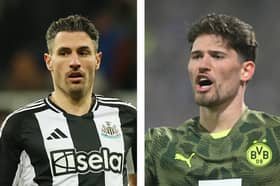 Fabian Schar (left) and Borussia Dortmund goalkeeper Gregor Kobel