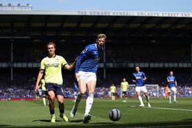 Jarrad Branthwaite of Everton  holds his hamstring before being substituted off due to injury during the Premier League match between Everton FC and Southampton FC at Goodison Park on May 18, 2025 in Liverpool, England. Goodison Park, home of Everton Football Club since August 24, 1892, will play host to its final Men's First Team fixture today ahead of the clubs move to the Hill Dickinson Stadium for the 2025/26 season. (Photo by Richard Heathcote/Getty Images)