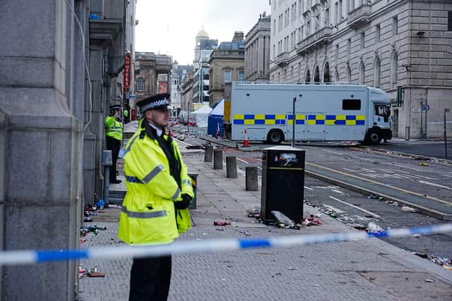 Aftermath of Liverpool parade incident.