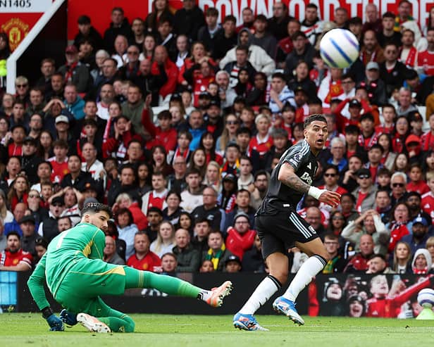 Morgan Rogers of Aston Villa scores a goal past Altay Bayindir of Manchester United which was later ruled out after the referee stopped play during the Premier League match between Manchester United FC and Aston Villa FC at Old Trafford on May 25, 2025 in Manchester, England. (Photo by Matt McNulty/Getty Images)